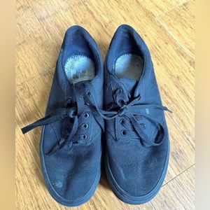 Black Vans, missing the inner cushions, size 10